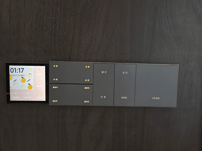 On-site installation photo of matte eco painted plastic smart switch panel for villa project, multi-button control panel for main light, spot light, light strip, curtain, scene modes and public area master control, mounted on dark wood wall