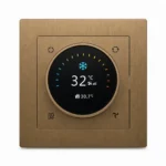 DERVIRGA brass-finish KNX rotary thermostat and room controller front view