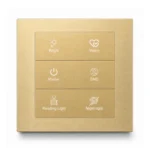 K602 KNX metal smart switch panel with six visible buttons in brass gold finish, front view
