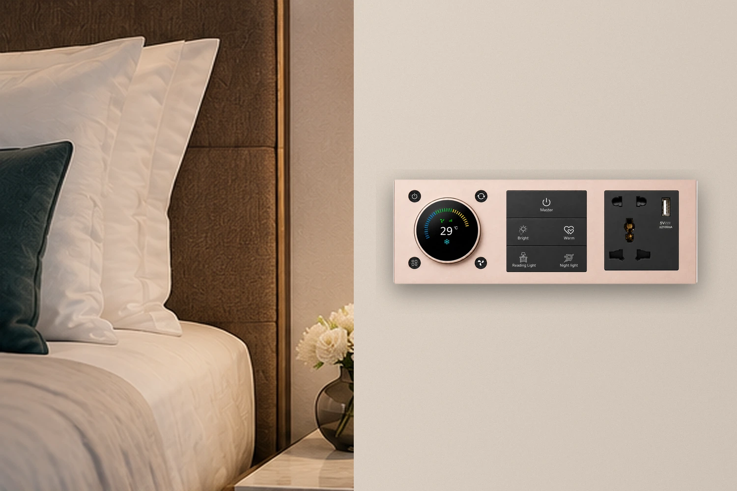Matching metal room control and socket panels in a hotel guest room